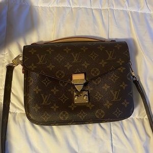 Authentic Louis Vuitton Pochette Métis Brown Monogram Canvas Purse.
